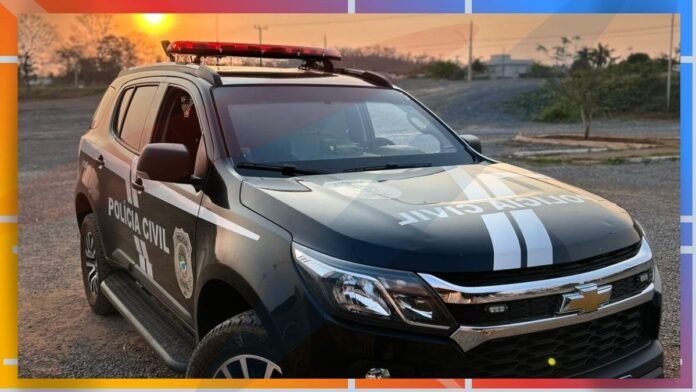Black Chevrolet police SUV with 'Polícia Civil' markings and a red roof light bar, parked on gravel at sunset
