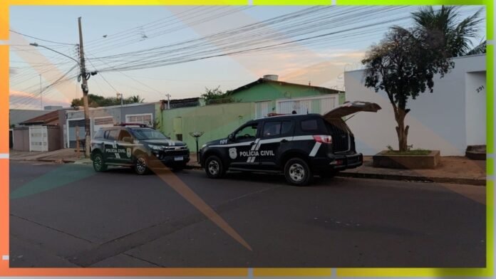 Two Polícia Civil SUVs parked on a residential street, one with its trunk open, during early evening light.