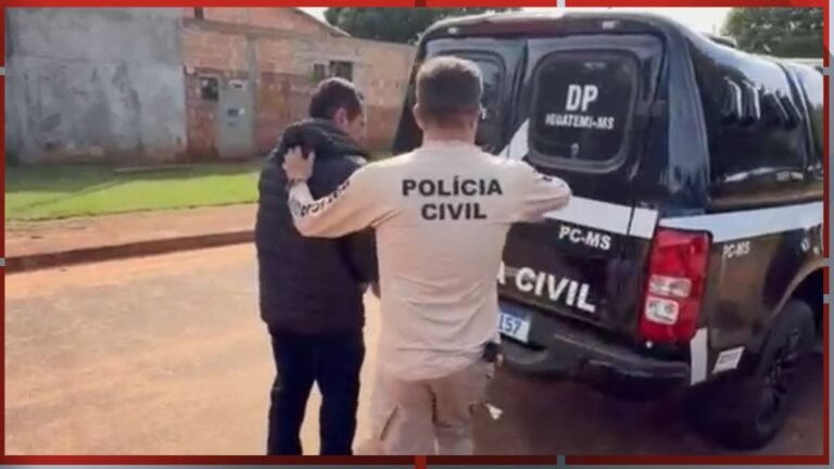 Two men stand beside a dark police van labeled POLícia CIVIL; one man with his arm around the other, as if guiding him toward the vehicle in a street.