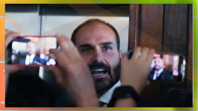 Bearded man speaks to cameras as two smartphones record him in close-up on the foreground