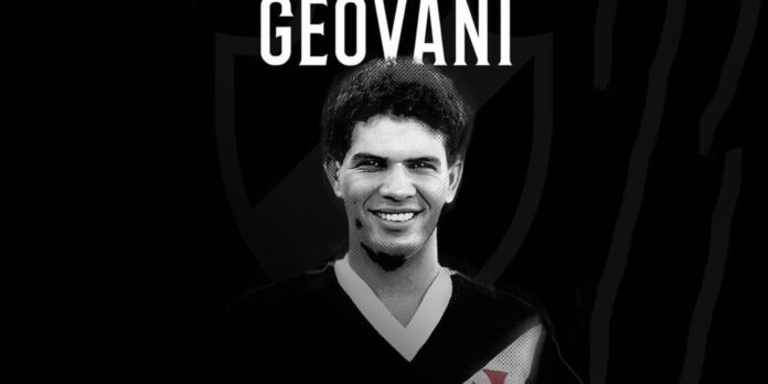Smiling man in a black-and-white sports jersey, with 'GEOVANI' above on a dark background. Stance is portrait-style.