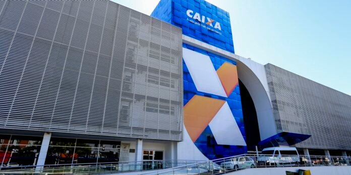 Exterior of Caixa bank building with blue glass panels and a large orange-white geometric mural against a curved entrance wall (modern architectural detail).