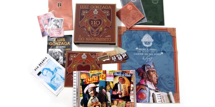 Collage of Luiz Gonzaga memorabilia: albums, posters, photos and a commemorative 110-year box collection answer