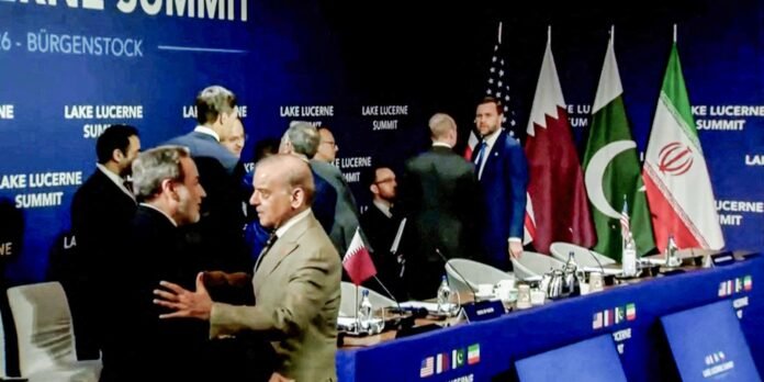 Group of dignitaries shaking hands at a Lake Lucerne Summit backdrop with flags of several nations nearby (US, Qatar, Iran, etc.).