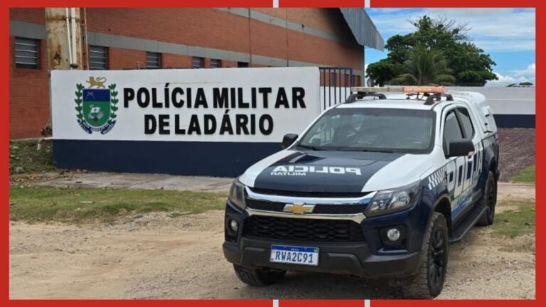 Police pickup truck in front of a sign that reads 'Polícia Militar de Ladário' with a crest on the left side (Brazil).