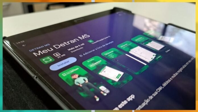 Tablet screen showing the Meu Detran MS app page with green app tiles on a dark purple background in a tilted angle.