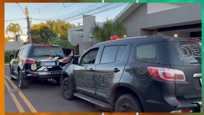 Two Polícia Civil police SUVs with DERF decals parked on a residential street, one door open.