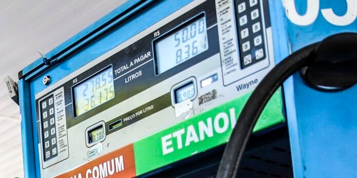 Close-up of a Brazilian gas pump showing price displays and the ETANOL sign.