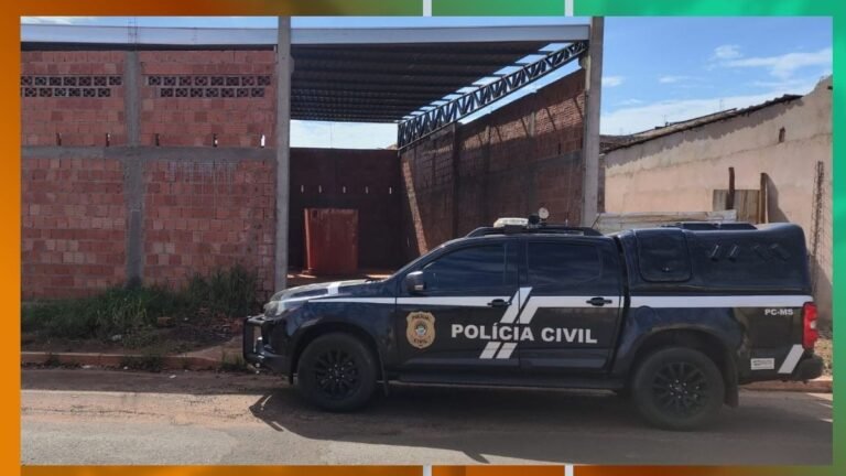 Polícia Civil pickup truck parked on a street beside an unfinished brick building under construction.