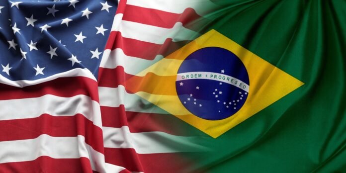 US and Brazil national flags overlapping and waving together, symbolizing cooperation or joint event.