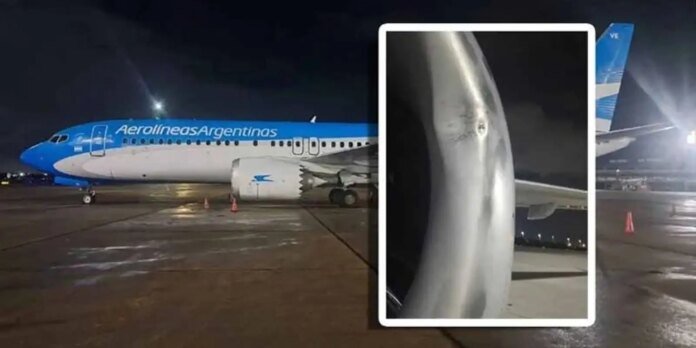 Nighttime view of an Aerolineas Argentinas plane on a wet tarmac with orange cones; inset shows a close-up of a curved aircraft metal surface (engine/fuselage).
