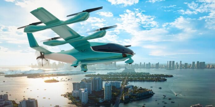 Futuristic teal flying car with multiple propellers gliding above a coastal city skyline and water below.