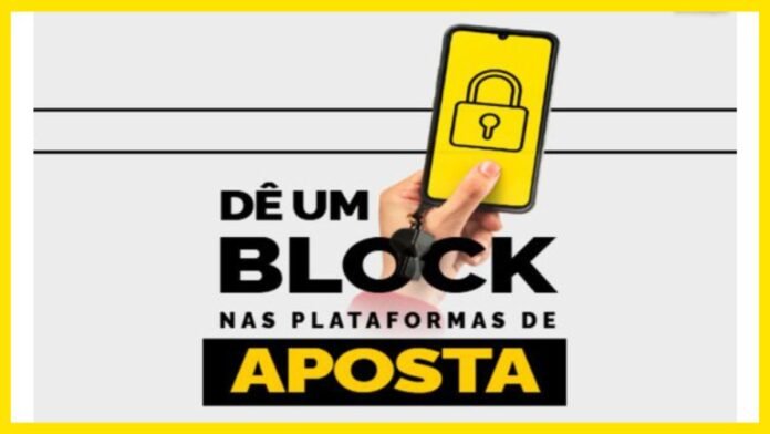 Campanha para bloquear plataformas de aposta: mão segurando celular amarelo com cadeado e texto DÊ UM BLOCK NAS PLATAFORMAS DE APOSTA.