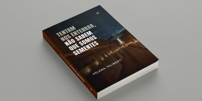 Book cover reading 'Tentam nos enterrar, não sabem que somos sementes' by Helena Taliberti, lying on a gray surface.