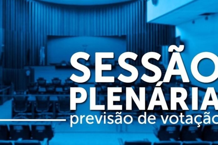 Blue-toned photo of an empty conference hall with large white text reading 'Sessão plenária previsão de votação'.